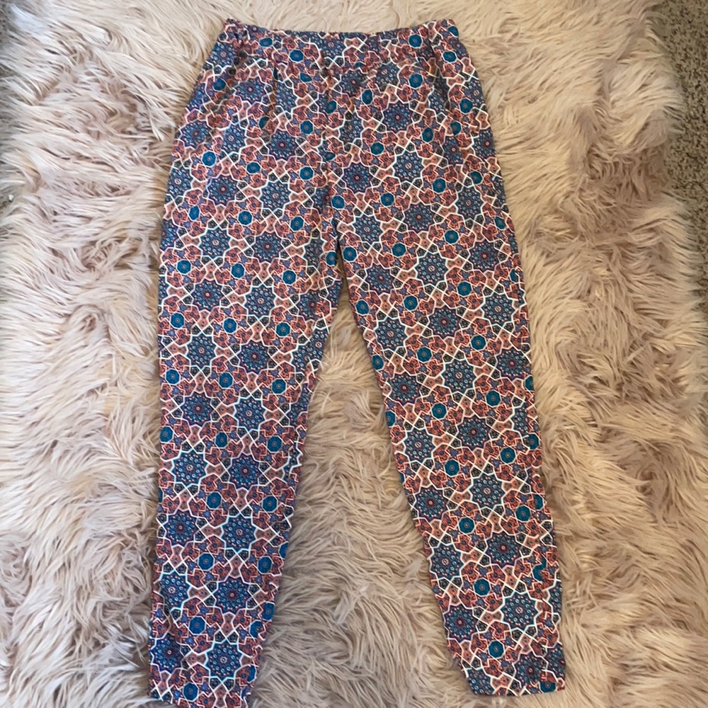 Red and blue patterned pants not sure the brand or size fits x small or small